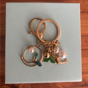 Elegant Mermaid Gold and Green Keychain with Pearl Accents